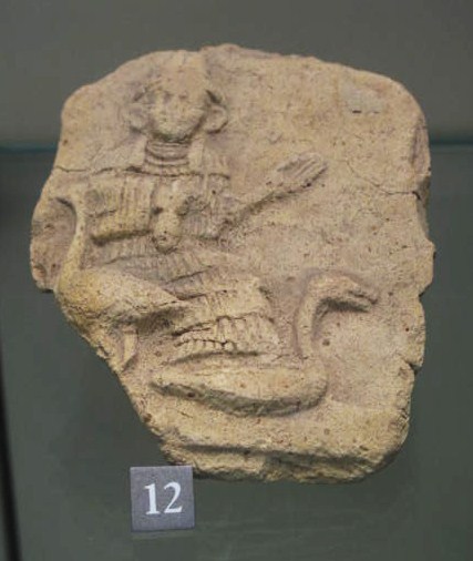  Small plaques or Teraphim, household gods Louvre