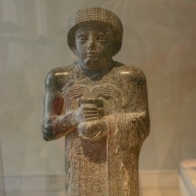 Statue with Gushing Vase at the Louvre Museum